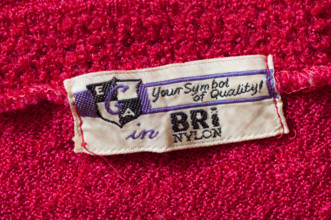 A bri-nylon label in 1960s or 1970s clothing.