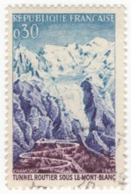 FRANCE - 1965 July 17: An 30 centimes blue, violet-blue and brown-violet postage stamp depicting Road and tunnel, Mont Blanc. For the opening of the Mont Blanc Tunnel, a highway tunnel between France ...