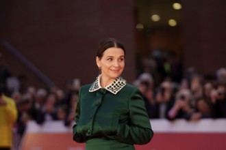 ROME, ITALY - OCTOBER 21: Juliette Binoche attends a red carpet for the movie "La Passion De Dodin Bouffant" (The Pot Au Feu) during the 18th Rome Fil