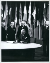 Jun. 06, 1945 - The San Fransisco Conference Arthur H Vandenberg, Untied States Senate, member of the Delegation from the Untied Sttes, signing the United Nations Charter, 26 June 1945