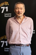 LOCARNO, SWITZERLAND – AUG 09, 2018: Hong Sang-soo attends the 'Gangbyun Hotel' photocall at the 71st Locarno Film Festival (Photo: Mickael Chavet)