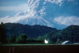 Giant plumes of volcanic ash pour from Mount St. Helens on the day of its major eruption, May 18, 1980.