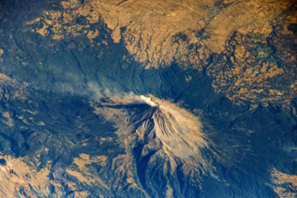 MEXICO - 25 January 2021 - The active volcano of Popocatépetl is pictured from the International Space Station as it orbited 261 miles above central M