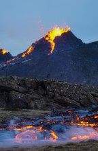 Molten lava flowing from a small volcanic eruption in Mt Fagradalsfjall, near the capital of Reykjavik, Southwest Iceland, in March 2021.