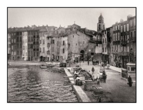 ST.TROPEZ VINTAGE RETRO 1900's Saint Tropez simple historic old fishing harbour port, with wooden fish boxes containers on harbour side waiting for the next fishing boat catch vessels, Cote d'Azur Fra...