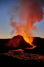 Amazing volcano landscape during eruption at night