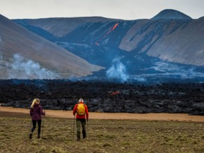 Local Icelanders visiting lava flows from Fagradalsfjall Volcano, Iceland