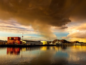Gas cloud from Fagradalsfjall, view of volcanic eruption at Grindavik Harbor, Iceland