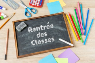 School slate with inscription "Rentrée des classes" in French