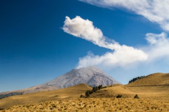 Smoking Popocatepetl volcano in central Mexico