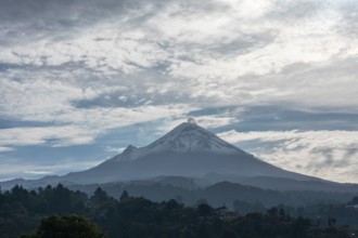 Popocatepetl volcano seen in the morning from a town in the state of Mexico, sunrise in the province.