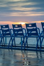 Picturesque blues chairs on the Promenade des Anglais in Nice on the French Riviera