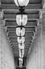 Portrait photo of The Arcade Ceiling and Lamps in The Palais Royale in the 1st Arrondissement, Paris.