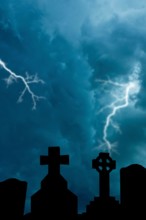 cemetery tombs and stormy sky