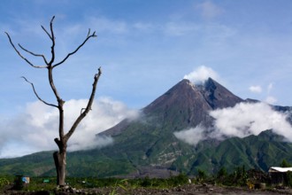 Mount Merapi, a cone-shaped and most active type of volcano in Indonesia. Has a height of 2968 meters.