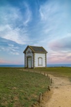 Belle-Ile in Brittany, small building on the cliffs at the Cote Sauvage, the foghorn house