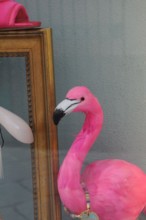 A flamingo in front of art deco background