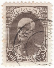 IRAN - 1937: 50 dinar postage stamp depicting portrait Reza Shah Pahlavi was shah of Iran from 1925 to 1941 and founder of the Pahlavi dynasty. Originally a military officer, he became a politician, s...
