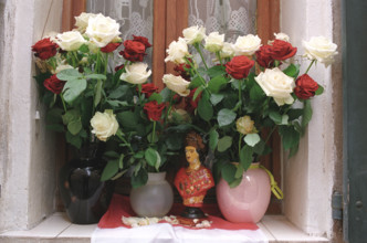 St Tropez, South of France. Les Bravades annual festival celebration of Patron Saint of town Saint Tropez effigy statue ion window ledge. 2000s 2005
