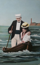 Nostalgic love lovers in fake rowingboat circa 1909 postcard