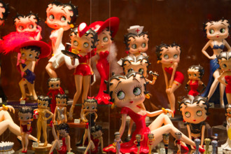 Betty Boop figurines on display in a shop window in Bourton-on-the-Water in the Cotswolds
