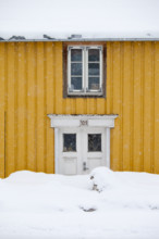 Traditional wooden buildings along Storgata in the quaint area of Tromso, in the Arctic Circle in Northern Norway
