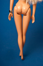Barbie doll naked, legs and buttock