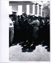 Feb. 28, 2012 - Grief stricken - Maj. General Suharto, newly appointed Army Chief of Staff in Indonesia, (in jungle suit) greets another officer at funeral services at Army Headquarters in Djakarta on...
