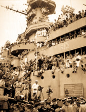 Spectators and photographers pick vantage spots on the deck of the USS MISSOURI in Tokyo Bay, to witness the formal Japanese surrender proceedings.  September 2, 1945. (Army)