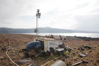 Nea Kameni Island. 14th February, 2015. in Santorini Greece, Costas Papazachos seismologist and professor at the Aristotle University of Thessaloniki and George Vougioukalakis, Dr. Volcanologist geoth...