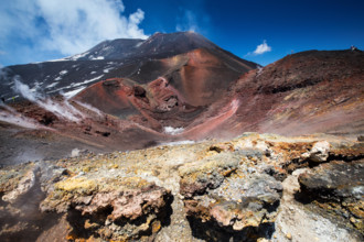 Craters of the Etna volcano, colored rocks. Region Sicily. Italy. Europe.