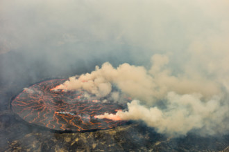 Climbing Mount Nyiragongo in Virunga National Park, Democratic Republic of Congo is an exciting adventure. The active volcano's crater holds lava lake.