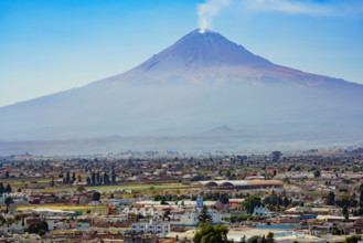 Aerial view of The beautiful Popocatepetl Mountain with smoke, Cholula, Mexico