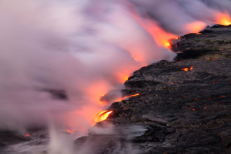 HI00341-00...HAWAI'I - Lava flowing into the Pacific Ocean from the East Riff Zoneof the Kilauea Volcano on the Island of Hawai'i.