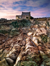 A colourful view at the beginning of sunset of the distinctive coast of Brittany