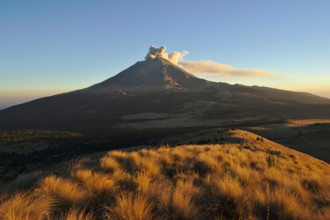Popocatépetl with ash eruption, evening light, near La Joya, Mexico