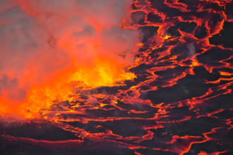 An active lava lake churns in the crater of Mount Nyiragongo Volcano, Kibati, Virunga National Park, Democratic Republic of Congo (DRC).