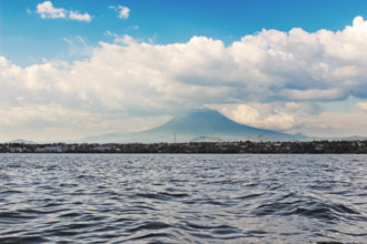 Lake Kivu, Rwanda, with Mount Nyiragongo of DR Congo in the Background. Nice Weather for a Boat Ride.