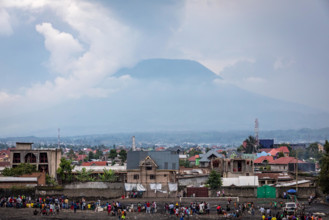 The city of Goma, Democratic Republic of Congo, with Nyiragongo volcano in the distance