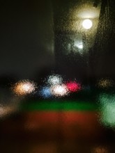 Night scene through frosted glass