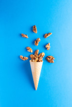 Ice cream cornet with nuts fruits