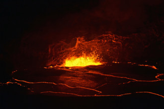 Active lava exploding inside the Halemaumau Crater at night, Kilauea Volcano, Volcanoes National Park, Big Island, Hawaii, USA