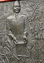 jakarta, dki jakarta/indonesia - april 20, 2009: detail of the relief at pancasila sakti  memorial site, sukarno holding spersemar