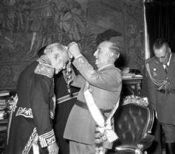 Dominican dictator Rafael Trujillo (left) is presented with an award by Spanish dictator Francisco Franco, 1954. The two tyrants were close friends and allies, and upon Trujillo's overthrow his son Ra...