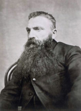 This photograph by Adolphe Braun, taken around 1889, shows the renowned sculptor Auguste Rodin with a crew cut hairstyle. It captures the artist in a personal moment, showcasing his distinctive look d...