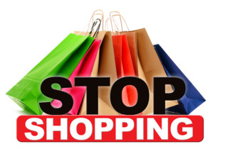Stop shopping sign with paper bags isolated on white