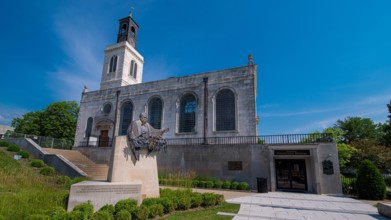 Fulton, MO--June 19, 2020; Bronze statue stands in front of National Winston Churchill Museum at Westminster College where the Iron Curtain speech was