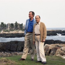 President George H. W. Bush escorts President François Mitterrand of France on a walking tour on Walker's Point in Kennebunkport.