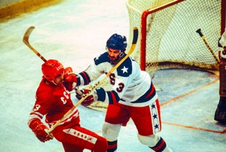 Ken Morrow of Team USA checks USSR player during the Men's Ice Hockey semi-final at the 1980 Olympic Winter Games.