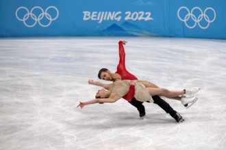 Beijing, Hebei, China. 14th Feb, 2022. French figure skaters GABRIELLA PAPADAKIS and GUILLAUME CIZERON ON their way to a gold medal at the Beijing 2022 Winter Olympics during their Free Dance performa...